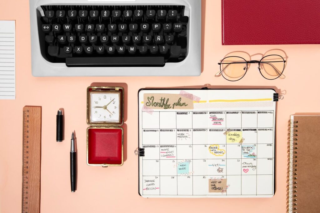 Journal, clock and keyboard, top view