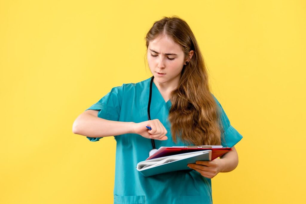 Front view of female doctor with medical notes