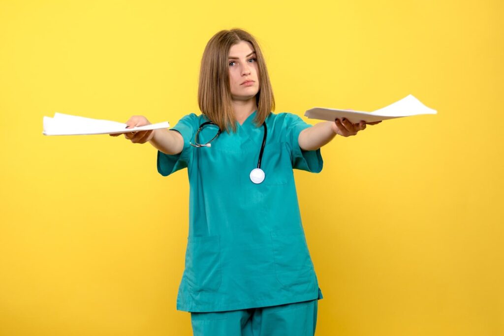 Front view female doctor holding files on a yellow space