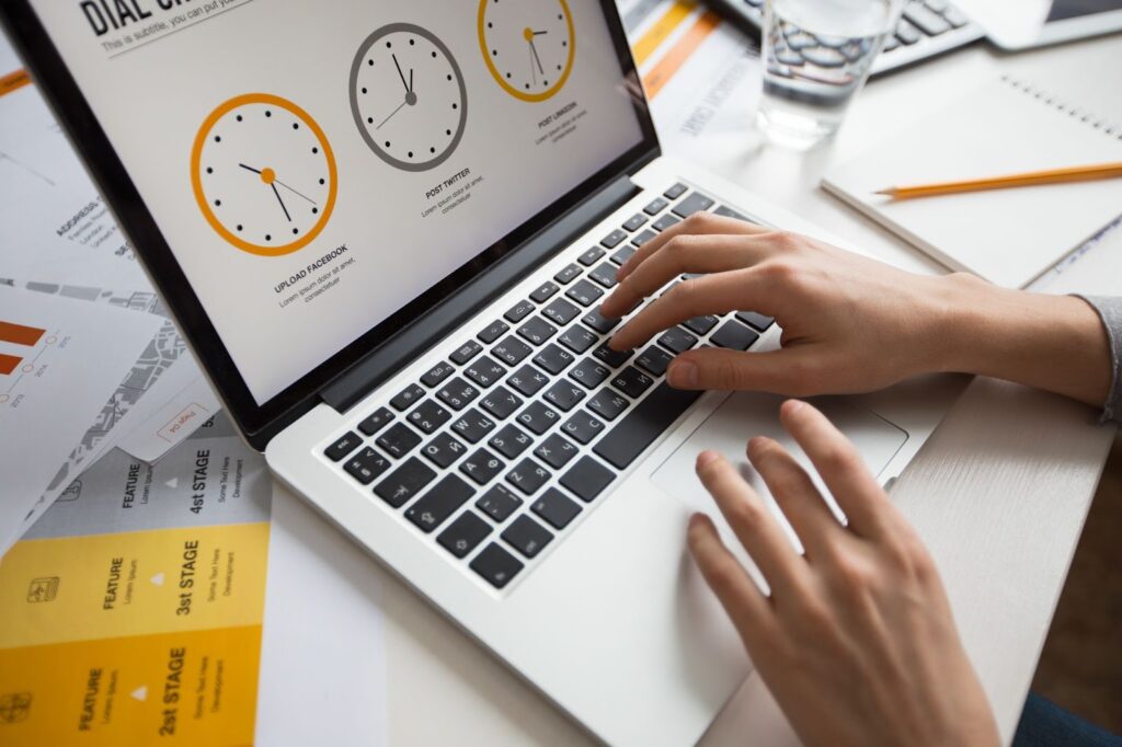 Woman working on time management on her laptop
